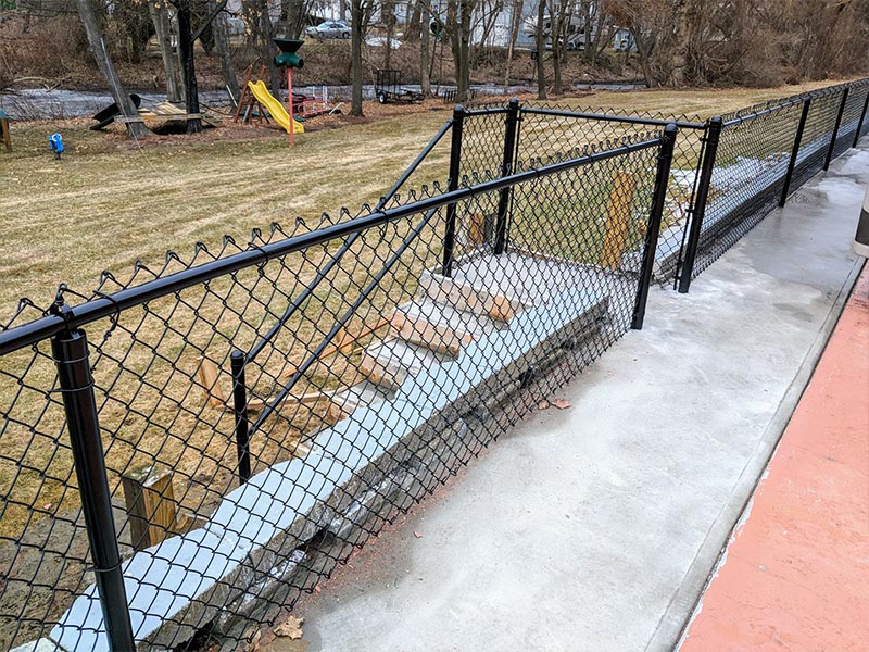 Commercial black chain link fence in Derry New Hampshire